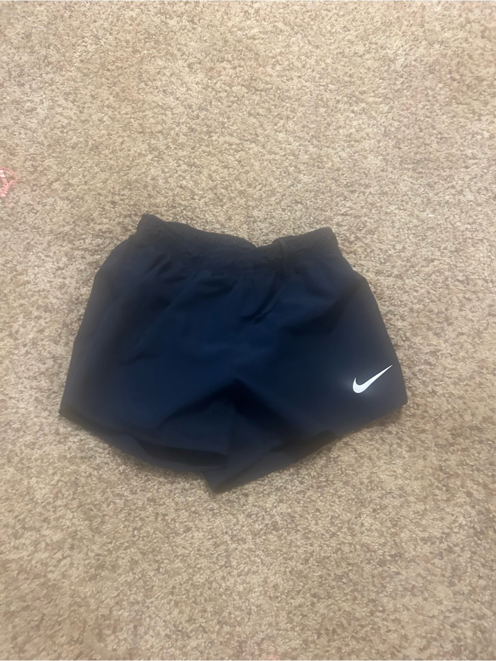 Women’s Nike shorts size xs like new navy blue and white flappy sides athletic
